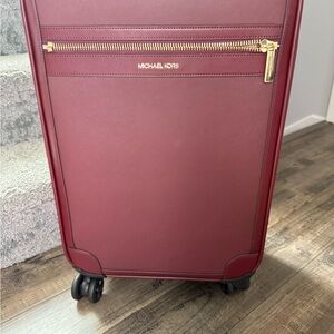 Michael Kors travel trolley small carry on in oxblood